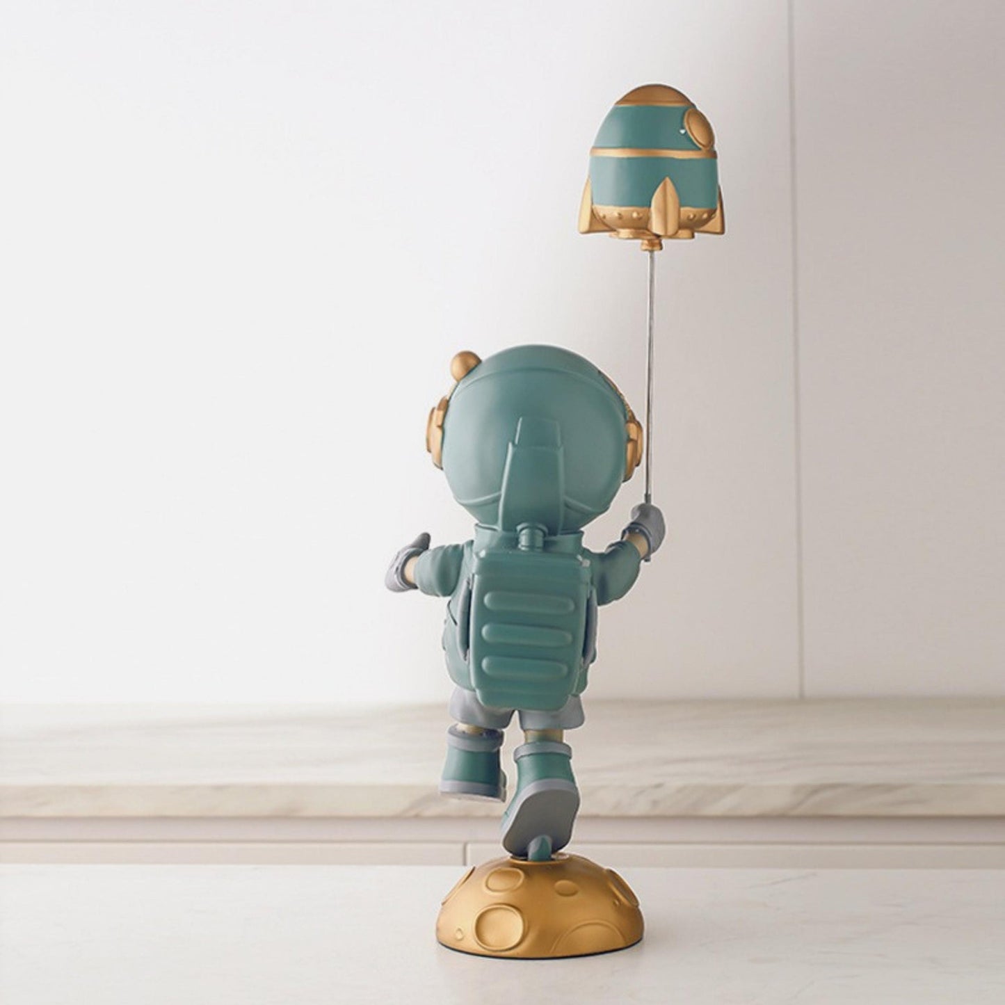Astronaut Holding a Rocket Balloon Statue - Space Mesmerise - Space Gifts | Lamps | Statues | Home Decor